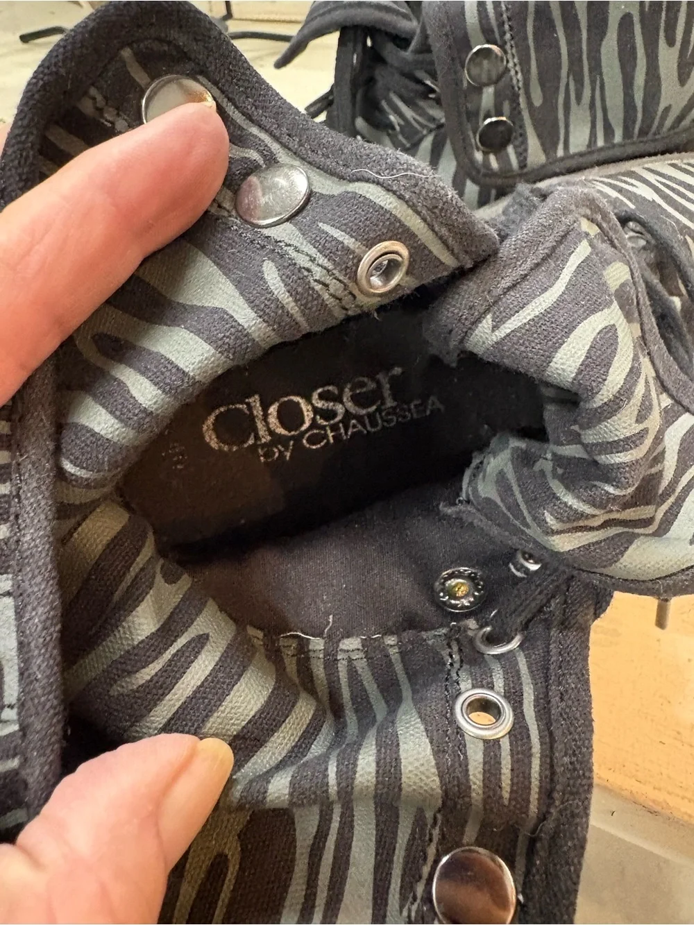 Closer By Chaussea Women’s Black Zebra-Print High Top Sneakers